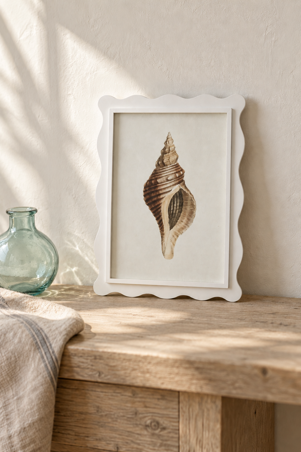 Scalloped Shell Study C leaning on a coastal console
