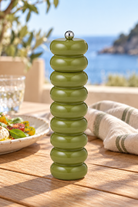 Olive Bubble Salt & Pepper Grinder styled in a sunlit coastal home; Coast to Coast KW2735