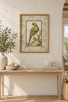 Long Tail Parrot bamboo-framed artwork styled in a sunlit coastal interior
