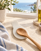 Amara marble spoon rest styled in a sunlit coastal kitchen