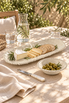 Sand Pearl long melamine platter styled with a neat cheese and cracker assortment