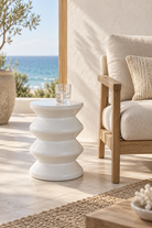 Torano glazed white stool in a coastal interior
